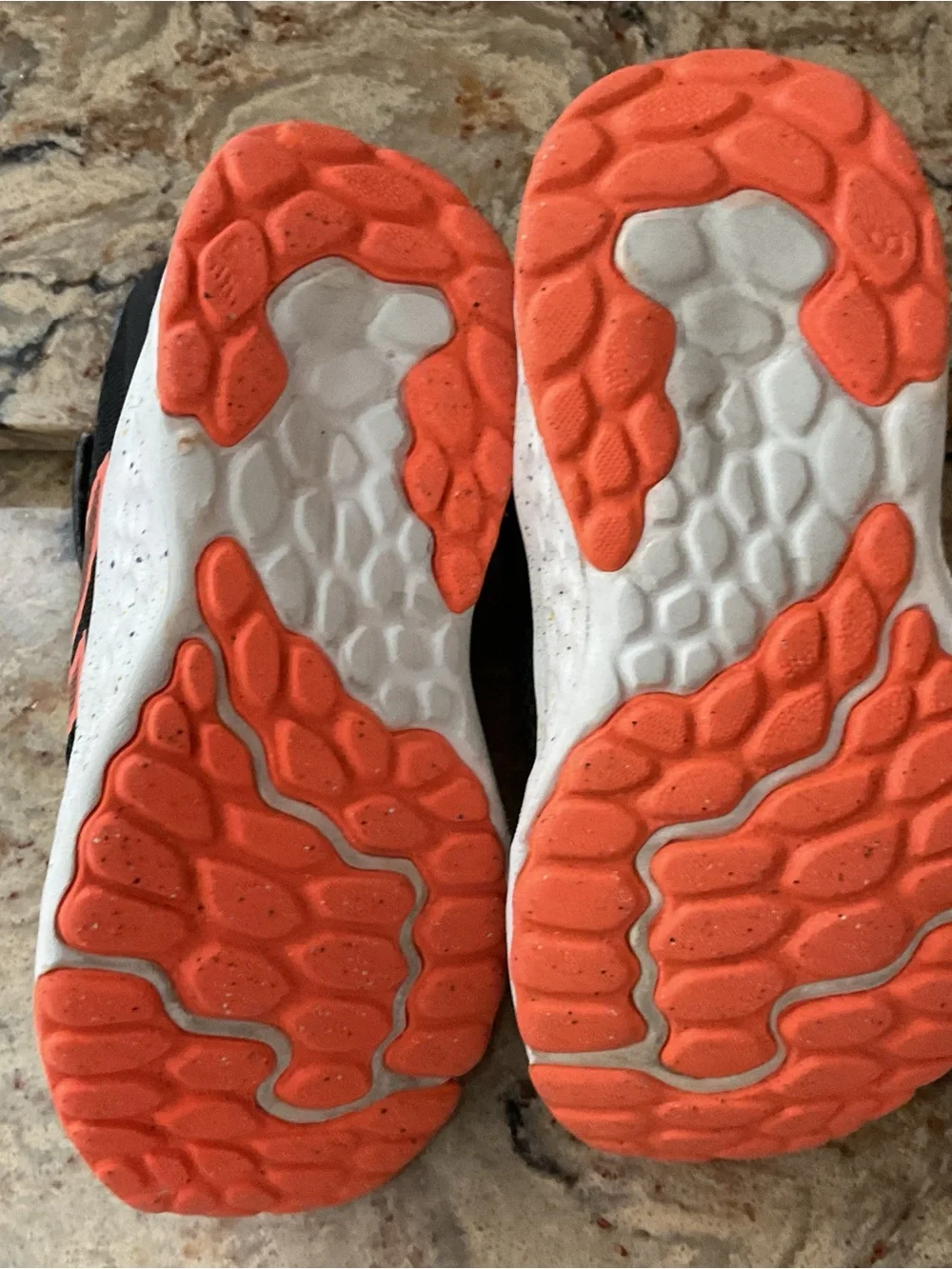 New Balance Kids Black Sneakers with Blue Lining and Coral Accent